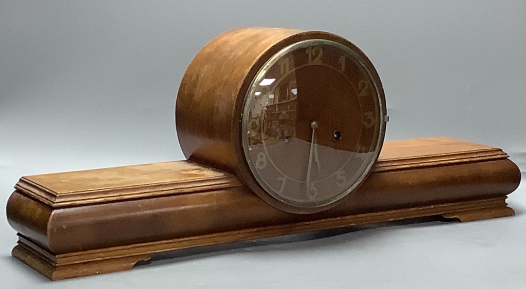 An Art Deco walnut mantel clock